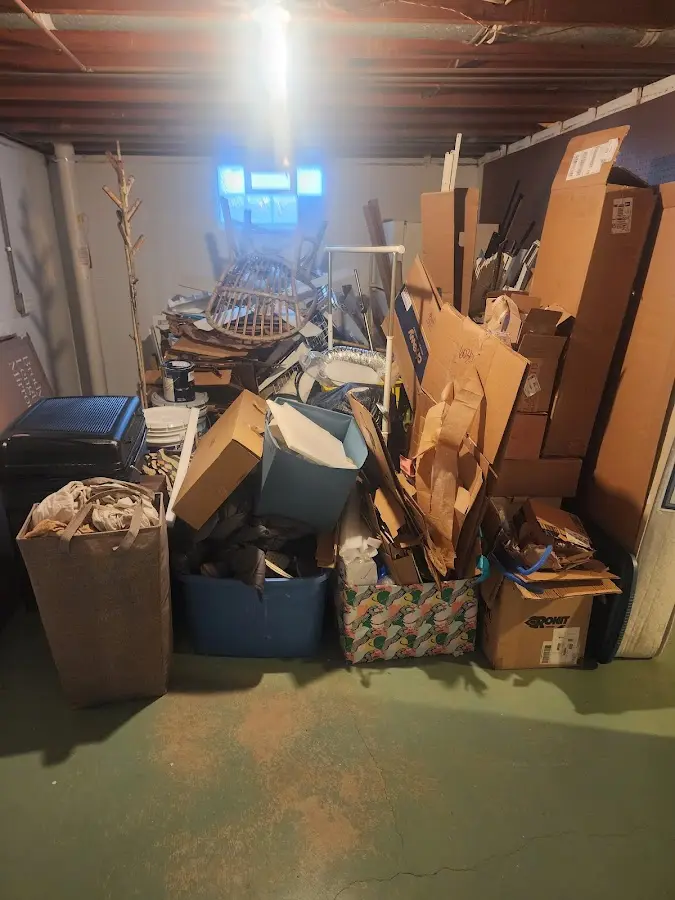 Roll-off dumpster container at job site for 2 Yard Dumpster Rental in Barrington